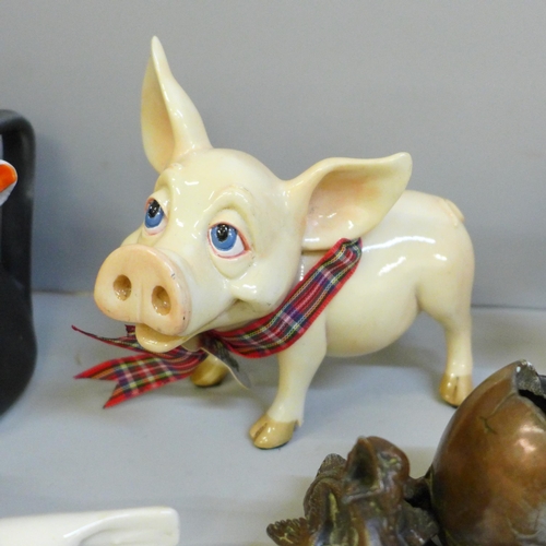 636 - A cow cream jug, Disney Goofy, Beswick seal, pig, etc., (6 items)