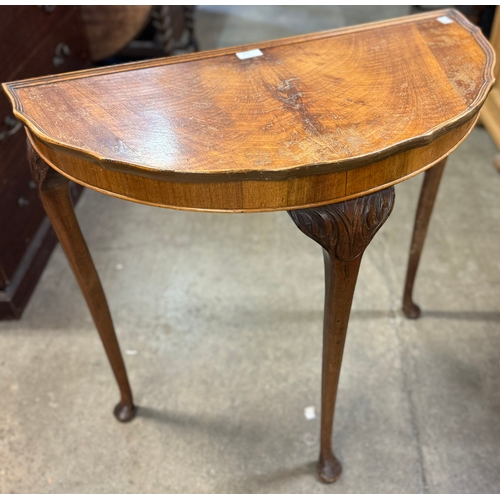 271 - A Queen Anne style walnut demi-lune hall table