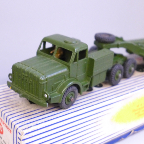 648 - Two Dinky Supertoys die-cast model vehicles, 622 10-ton Army Truck and 660 Tank Transporter, both bo... 