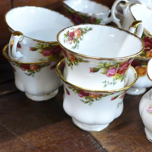 671 - A Royal Albert Old Country Roses six setting tea set and Tranquility six setting tea set, lacking su... 