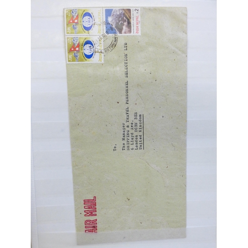 673 - Nepal stamps and postal history in album