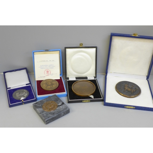 682 - A collection of cased medallions, awards for service in the poultry industry to Dr Payne including o... 