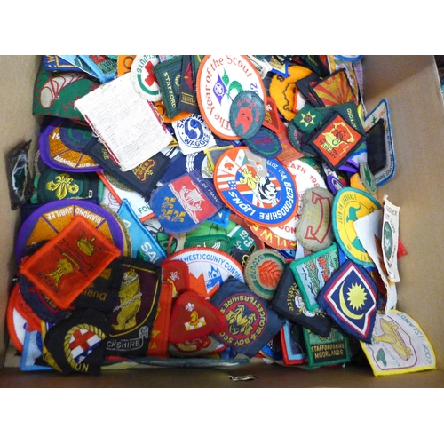 686 - A large collection of vintage Boy Scout Badges, including Singapore, Malaysia and other non UK