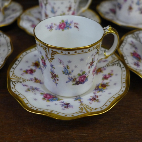 694 - A Royal Crown Derby Royal Antoinette six setting coffee service (4 cups, 4 saucers, cream and sugar ... 