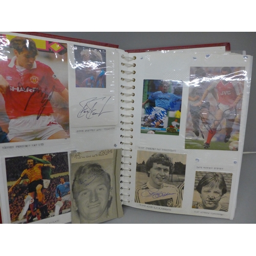 699 - An album with a collection of signed football pictures, all ex players, 148 in total includes Trevir... 