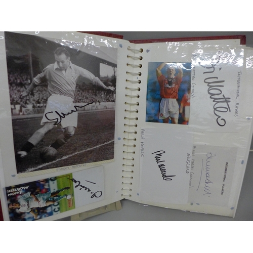 699 - An album with a collection of signed football pictures, all ex players, 148 in total includes Trevir... 