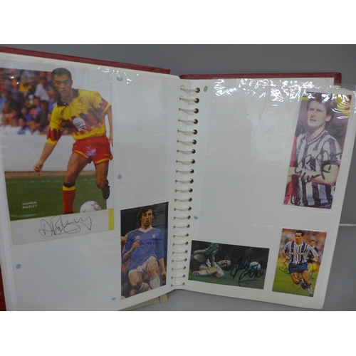 699 - An album with a collection of signed football pictures, all ex players, 148 in total includes Trevir... 