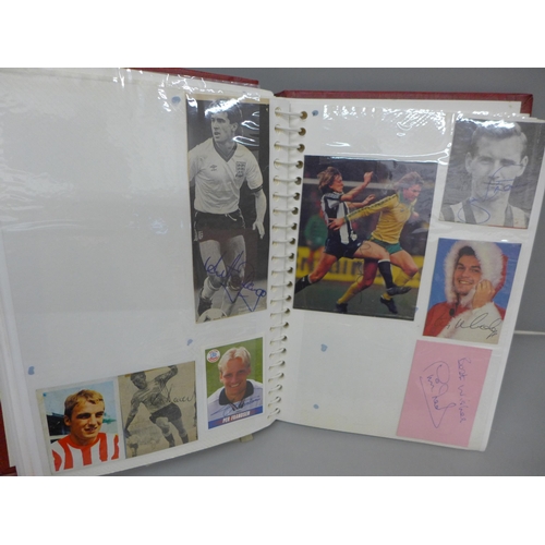 699 - An album with a collection of signed football pictures, all ex players, 148 in total includes Trevir... 