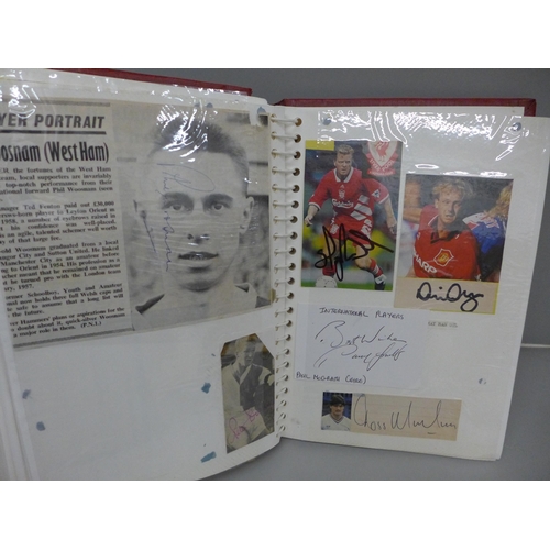 699 - An album with a collection of signed football pictures, all ex players, 148 in total includes Trevir... 