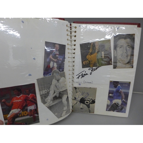 699 - An album with a collection of signed football pictures, all ex players, 148 in total includes Trevir... 
