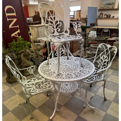 314 - A Victorian style cast metal garden table and four chairs