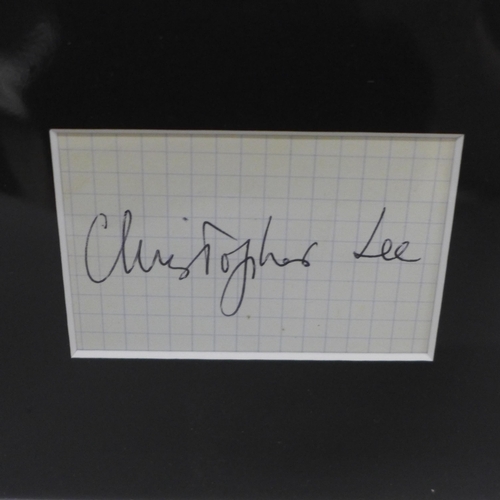 714 - A Christopher Lee signed display