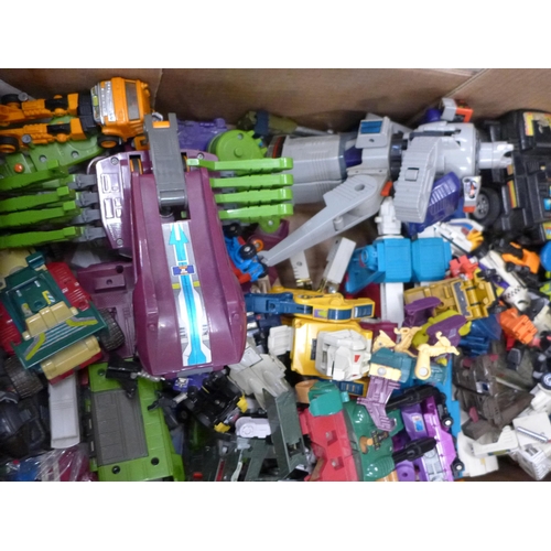 744 - A collection of late 80s/early 1990s Transformers toys