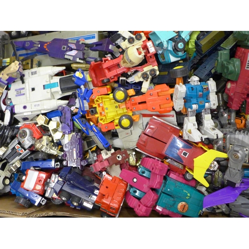 744 - A collection of late 80s/early 1990s Transformers toys