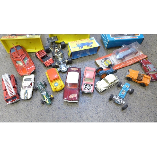 753 - Two Politoys F1 cars in cases and other die-cast model vehicles including Dinky, etc.