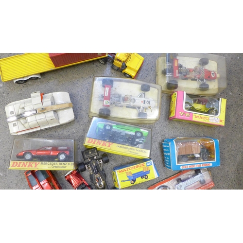 753 - Two Politoys F1 cars in cases and other die-cast model vehicles including Dinky, etc.
