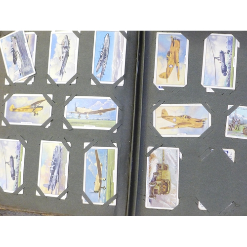 755 - A large collection of cigarette cards and albums