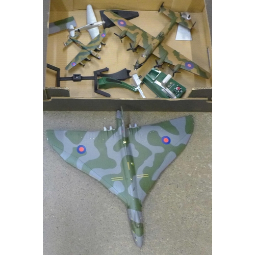 757 - A Corgi die-cast model of a Lancaster bomber, an Avro Vulcan, etc.