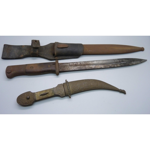 758 - A bayonet with scabbard and a dagger with scabbard