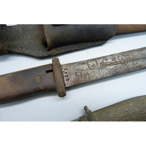 758 - A bayonet with scabbard and a dagger with scabbard