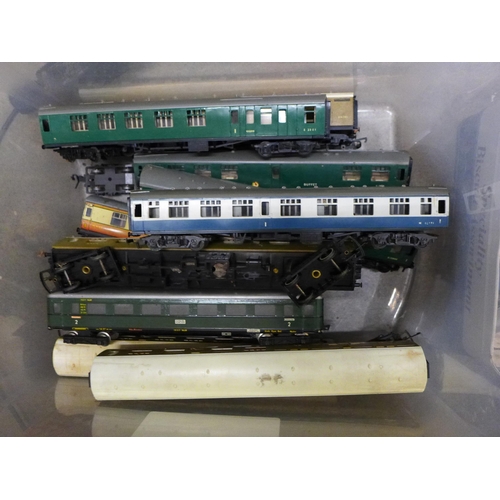 766 - Two boxes of model rail buildings, three Airfix kits, carriages, etc., OO gauge