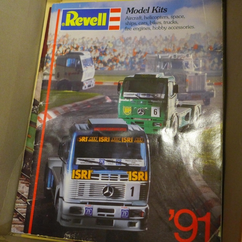 771 - A box of dealers/collectors toy catalogues including Revell, Palitoy, Scalextric, etc.,