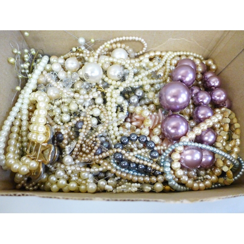 778 - A box of faux pearl necklets and bracelets