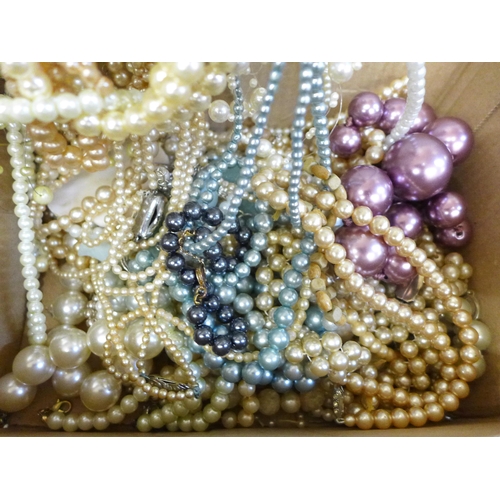 778 - A box of faux pearl necklets and bracelets