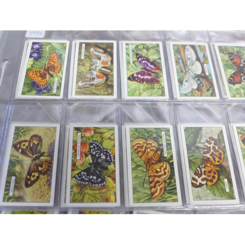 798 - Twenty sets of cigarette cards