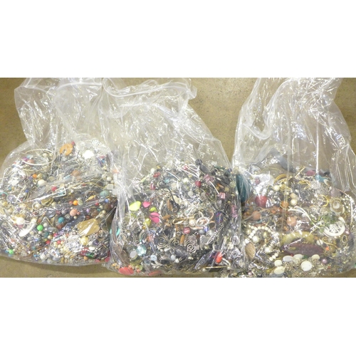 807 - Three large bags of costume jewellery