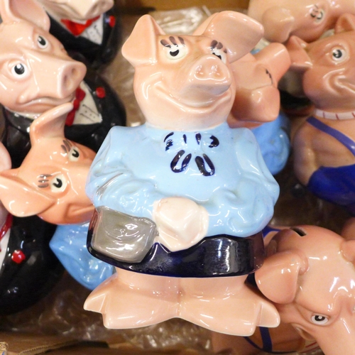 810 - A collection of Wade Nat West pigs, thirteen in total **PLEASE NOTE THIS LOT IS NOT ELIGIBLE FOR IN-... 