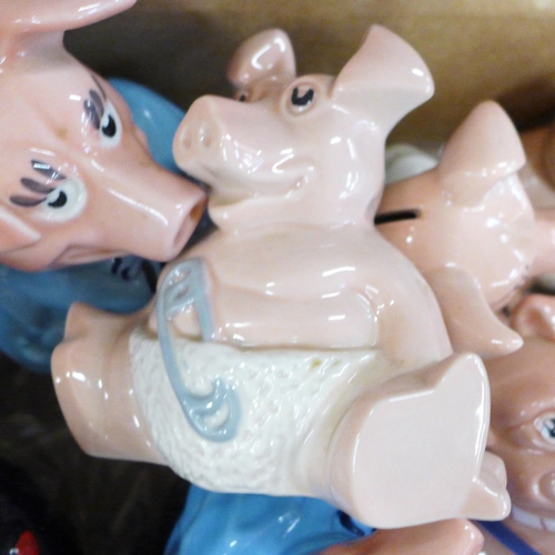 810 - A collection of Wade Nat West pigs, thirteen in total **PLEASE NOTE THIS LOT IS NOT ELIGIBLE FOR IN-... 