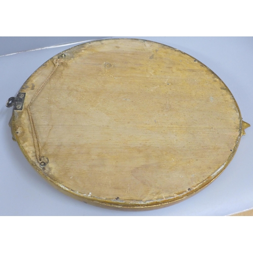 835 - A gilt framed oval wall mirror, 30cm wide