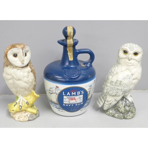 843 - Two Whyte & Mackay scotch whisky decanters - barn owl and snowy owl and a bottle of Alfred Lamb's na... 