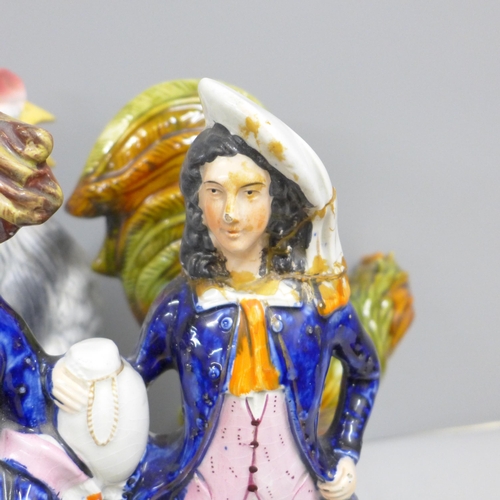 848 - A Staffordshire flat back figure, a cockerel jug and a majolica cockerel