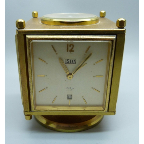 859 - An Imhof mid-century desk clock and weather compendium, brass and gilt finish, 9.5cm, one brass scre... 