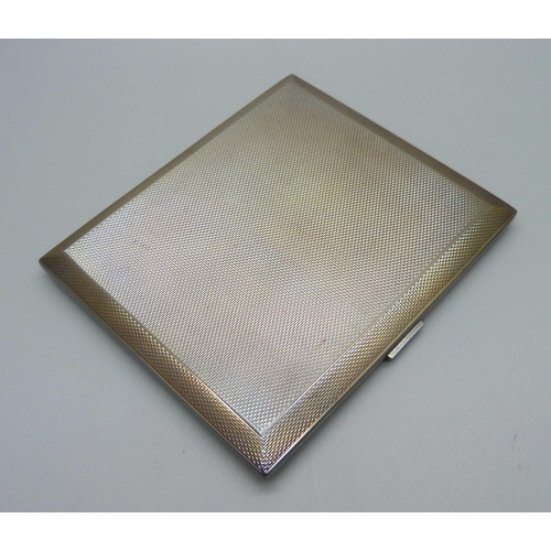 880 - An engine turned silver cigarette case, 141g, 82mm x 95mm