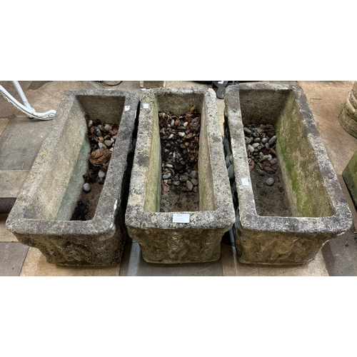 317 - A set of three rectangular concrete garden troughs