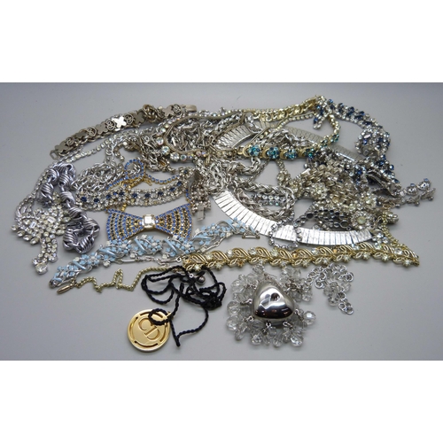 907 - Vintage silver tone jewellery including two Monet necklaces and a Dior lip gloss