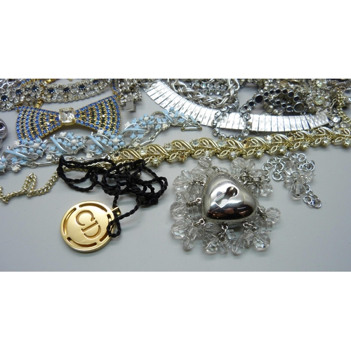 907 - Vintage silver tone jewellery including two Monet necklaces and a Dior lip gloss