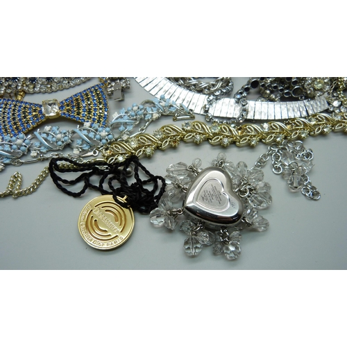 907 - Vintage silver tone jewellery including two Monet necklaces and a Dior lip gloss