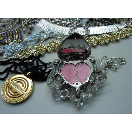 907 - Vintage silver tone jewellery including two Monet necklaces and a Dior lip gloss