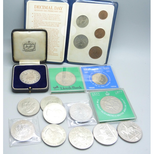 911 - A silver medallion dated 1936, 28g, two £5 commemorative coins and other commemorative coins and a 5... 