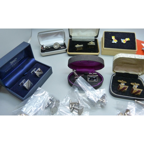 924 - A collection of cufflinks, tie-pins and clips