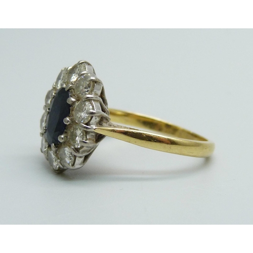 940 - An 18ct gold, sapphire and diamond cluster ring, 4.9g, O, approximately 1ct total diamond weight