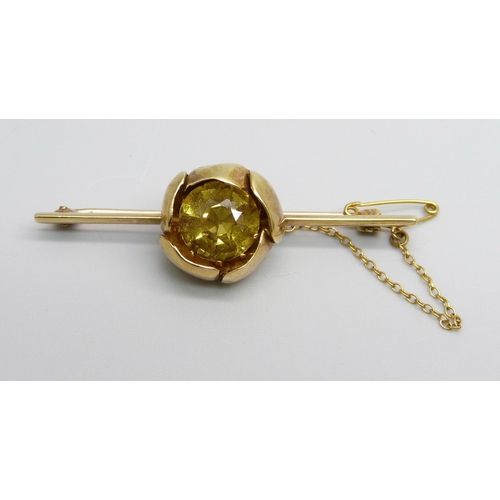 943 - A 15ct gold and citrine brooch, 7.2g