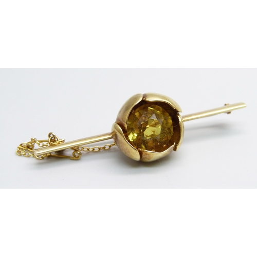 943 - A 15ct gold and citrine brooch, 7.2g