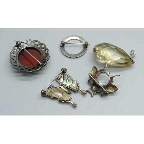 945 - A Scottish silver Iona brooch, a silver Trifari insect brooch, two other brooches and a pendant, (in... 