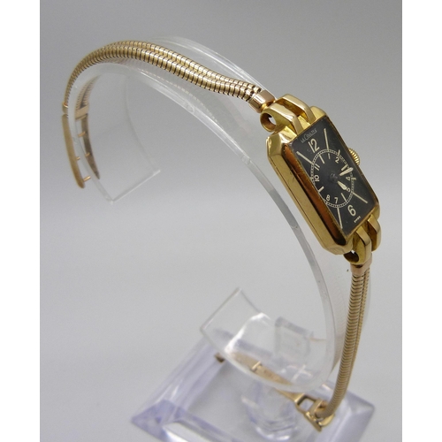 949 - A lady's 18ct gold cased LeCoultre Art Deco wristwatch on a 9ct gold bracelet strap, the case hallma... 