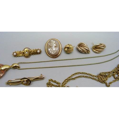 957 - A collection of jewellery; two 15ct gold and diamond brooches, one lacking pin, two 9ct gold pendant... 